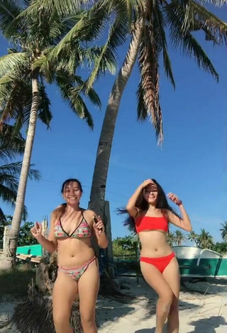 2. Hot Isabel Luche in Orange Bikini at the Beach