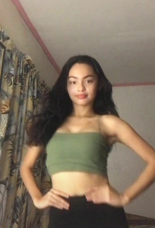 5. Cute Isabel Luche Shows Cleavage in Olive Crop Top