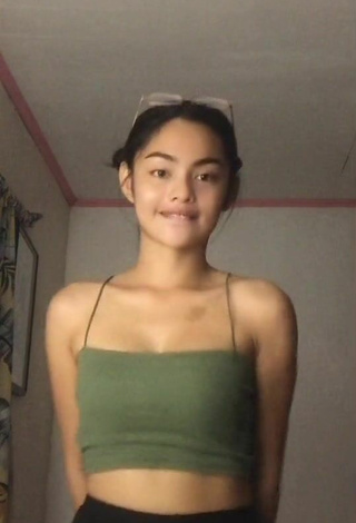 2. Hot Isabel Luche Shows Cleavage in Olive Crop Top