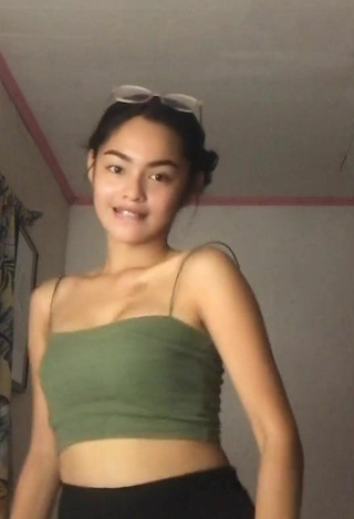 5. Hot Isabel Luche Shows Cleavage in Olive Crop Top