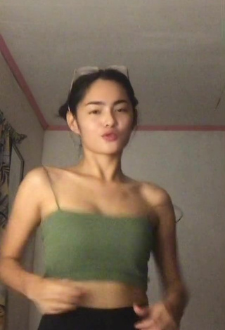6. Hot Isabel Luche Shows Cleavage in Olive Crop Top