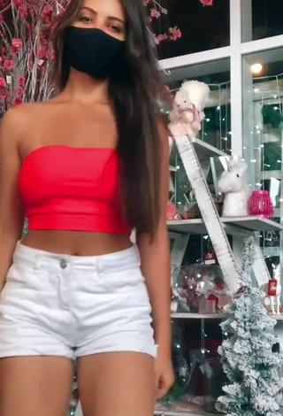 Sexy Isa Pinheiro Shows Cleavage in Red Tube Top