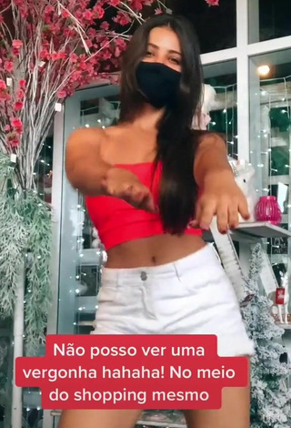 6. Sexy Isa Pinheiro Shows Cleavage in Red Tube Top