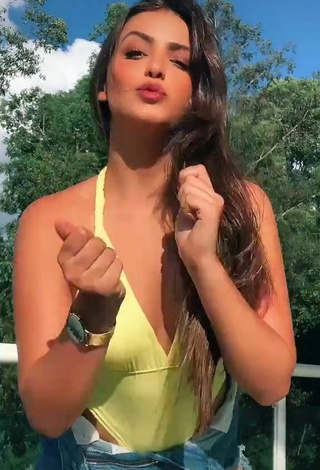 Sexy Isa Pinheiro Shows Cleavage in Yellow Swimsuit