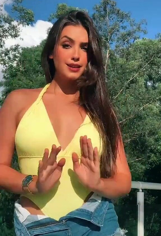 3. Sexy Isa Pinheiro Shows Cleavage in Yellow Swimsuit