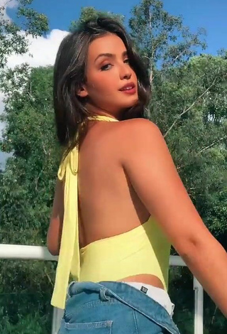5. Sexy Isa Pinheiro Shows Cleavage in Yellow Swimsuit