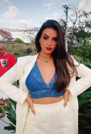 Sexy Isa Pinheiro Shows Cleavage in Blue Bra in a Street