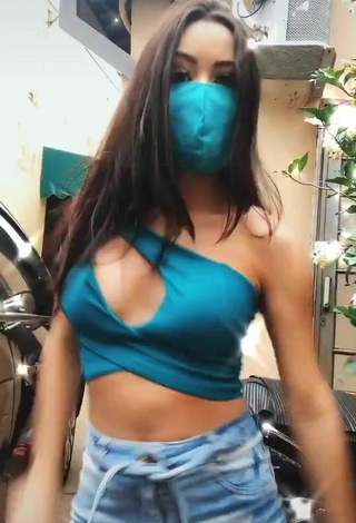 2. Erotic Carol Nunes Shows Cleavage in Turquoise Crop Top without  Bra