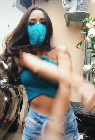 4. Erotic Carol Nunes Shows Cleavage in Turquoise Crop Top without  Bra