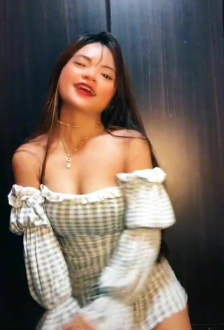 5. Hot Angela Mae Evangelista Shows Cleavage in Checkered Dress