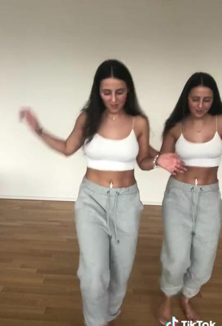 5. Lovely jakictwins Shows Cleavage in White Crop Top