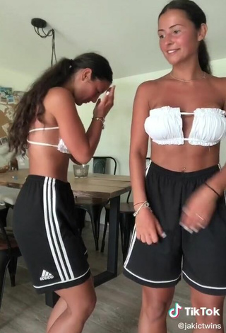 3. Hot jakictwins Shows Cleavage in White Bikini Top