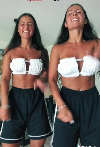 3. Sexy jakictwins Shows Cleavage in White Bikini Top