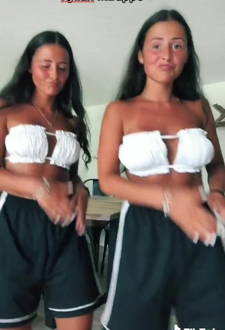 4. Sexy jakictwins Shows Cleavage in White Bikini Top