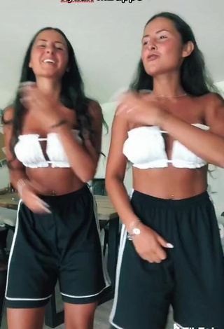 6. Sexy jakictwins Shows Cleavage in White Bikini Top