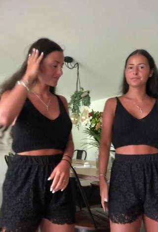 1. Hot jakictwins Shows Cleavage in Black Crop Top