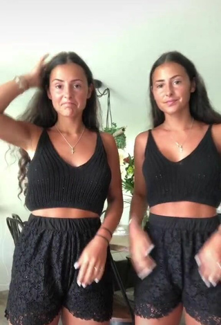 3. Hot jakictwins Shows Cleavage in Black Crop Top