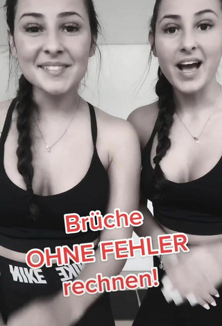 3. Sexy jakictwins Shows Cleavage in Black Sport Bra