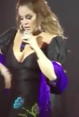 3. Sexy Jenni Rivera Shows Cleavage in Dress