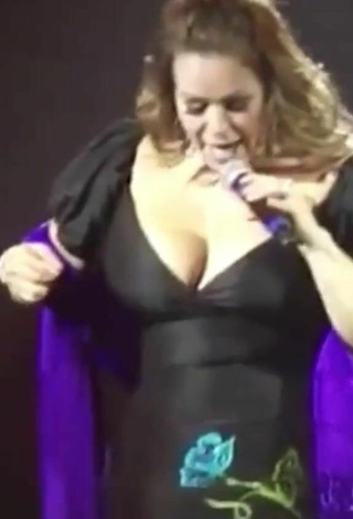 4. Sexy Jenni Rivera Shows Cleavage in Dress