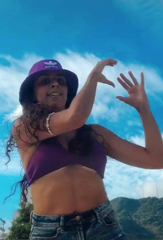 2. Sexy Ju Muniz Shows Cleavage in Purple Bikini Top