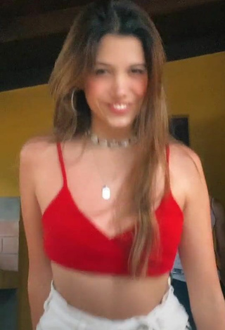 Sexy Justina Castro Shows Cleavage in Red Bikini Top