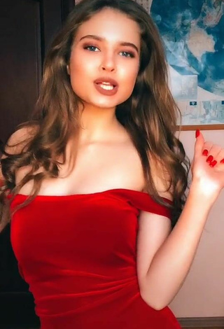 3. Sexy Katrine Shows Cleavage in Red Dress