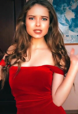 4. Sexy Katrine Shows Cleavage in Red Dress
