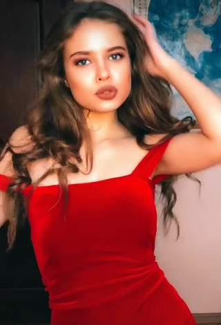 6. Sexy Katrine Shows Cleavage in Red Dress
