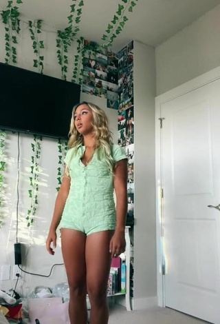 Sexy Kenna Mo Shows Cleavage in Light Green Overall