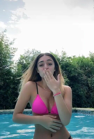 4. Adorable kiki Shows Cleavage in Seductive Pink Bikini Top at the Swimming Pool