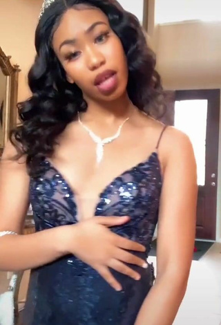 3. Sexy Amya Tolbert Shows Cleavage in Dress