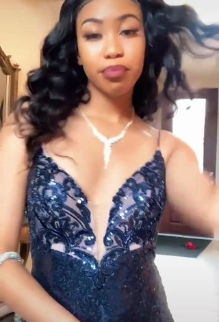 6. Sexy Amya Tolbert Shows Cleavage in Dress