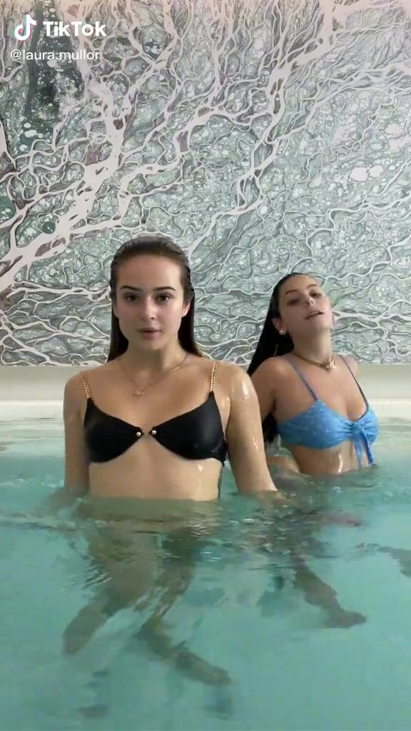 Sexy Laura Mullor Shows Cleavage in Black Bikini Top at the Pool