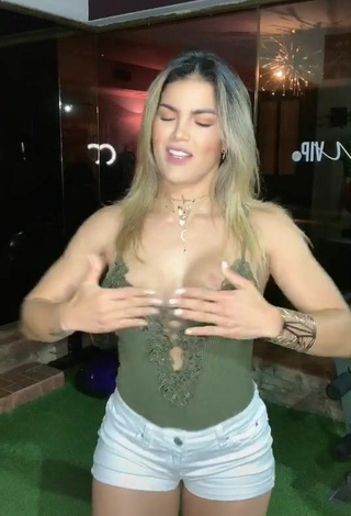 4. Hot Laura Fuentes Shows Cleavage in Olive Top