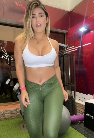 Sexy Laura Fuentes in Green Tight Pants in the Sports Club