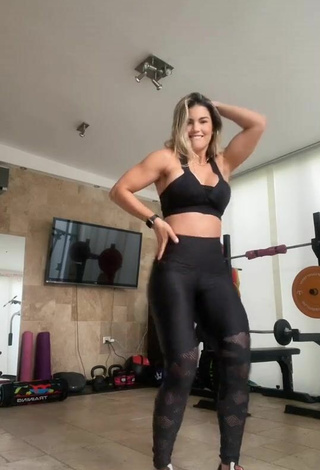 5. Sweetie Laura Fuentes Shows Cleavage in Black Sport Bra in the Sports Club