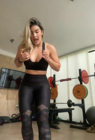 2. Cute Laura Fuentes Shows Cleavage in Black Sport Bra in the Sports Club