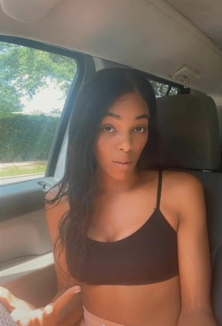 3. Sexy Law Shows Cleavage in Black Crop Top in a Car