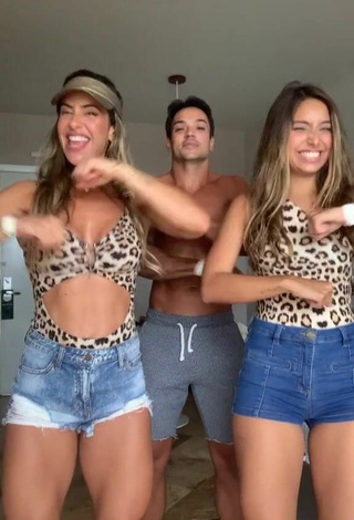 6. Hot Lica Lopes Ramalho Shows Cleavage in Leopard Swimsuit