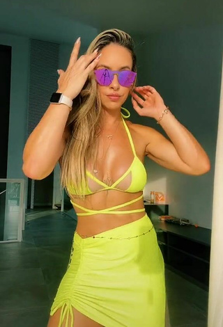 1. Cute Lica Lopes Ramalho Shows Cleavage in Yellow Bikini Top