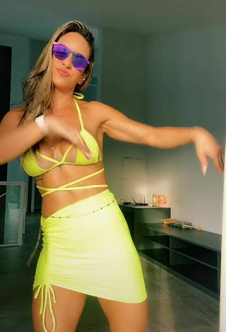 5. Cute Lica Lopes Ramalho Shows Cleavage in Yellow Bikini Top