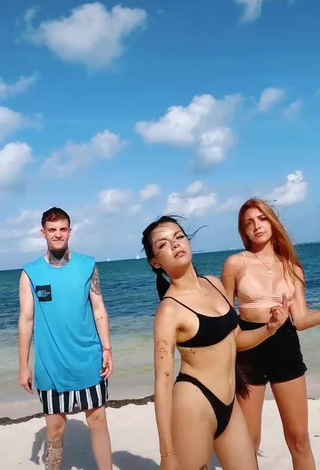 4. Hot Lili Sixx Shows Cleavage in Black Bikini at the Beach