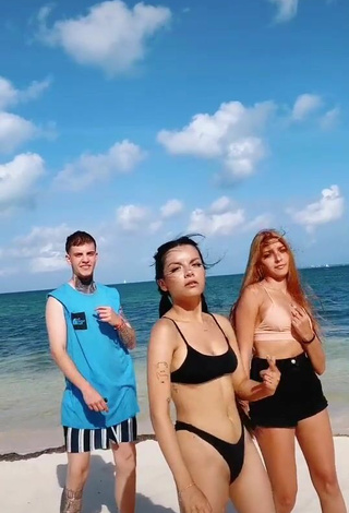 5. Hot Lili Sixx Shows Cleavage in Black Bikini at the Beach