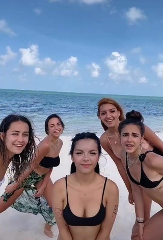 2. Sexy Lili Sixx Shows Cleavage in Black Bikini at the Beach
