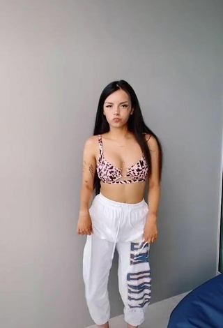 2. Sexy Lili Sixx Shows Cleavage in Bikini Top