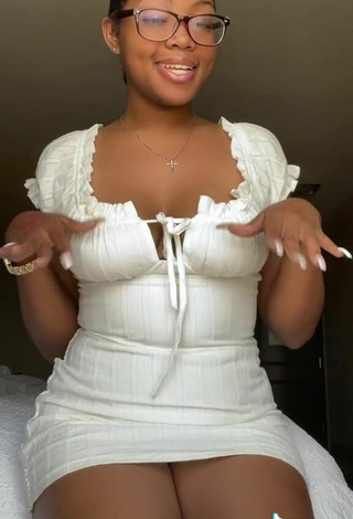 3. Hot Destinyy Shows Cleavage in White Dress Braless