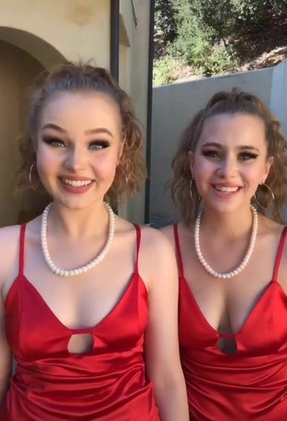 3. Sexy Lacey James Shows Cleavage in Red Dress