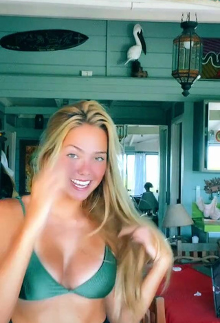 4. Beautiful Maeva Reichert Shows Cleavage in Sexy Green Bikini Top