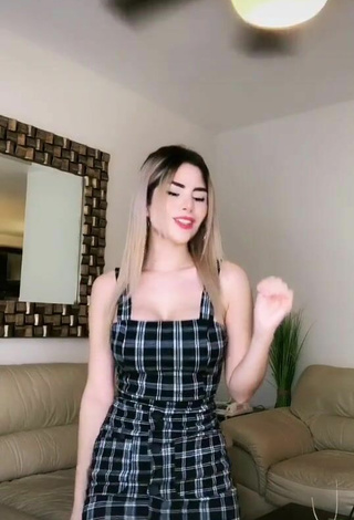 Cute Mafer Payan Shows Cleavage in Checkered Dress